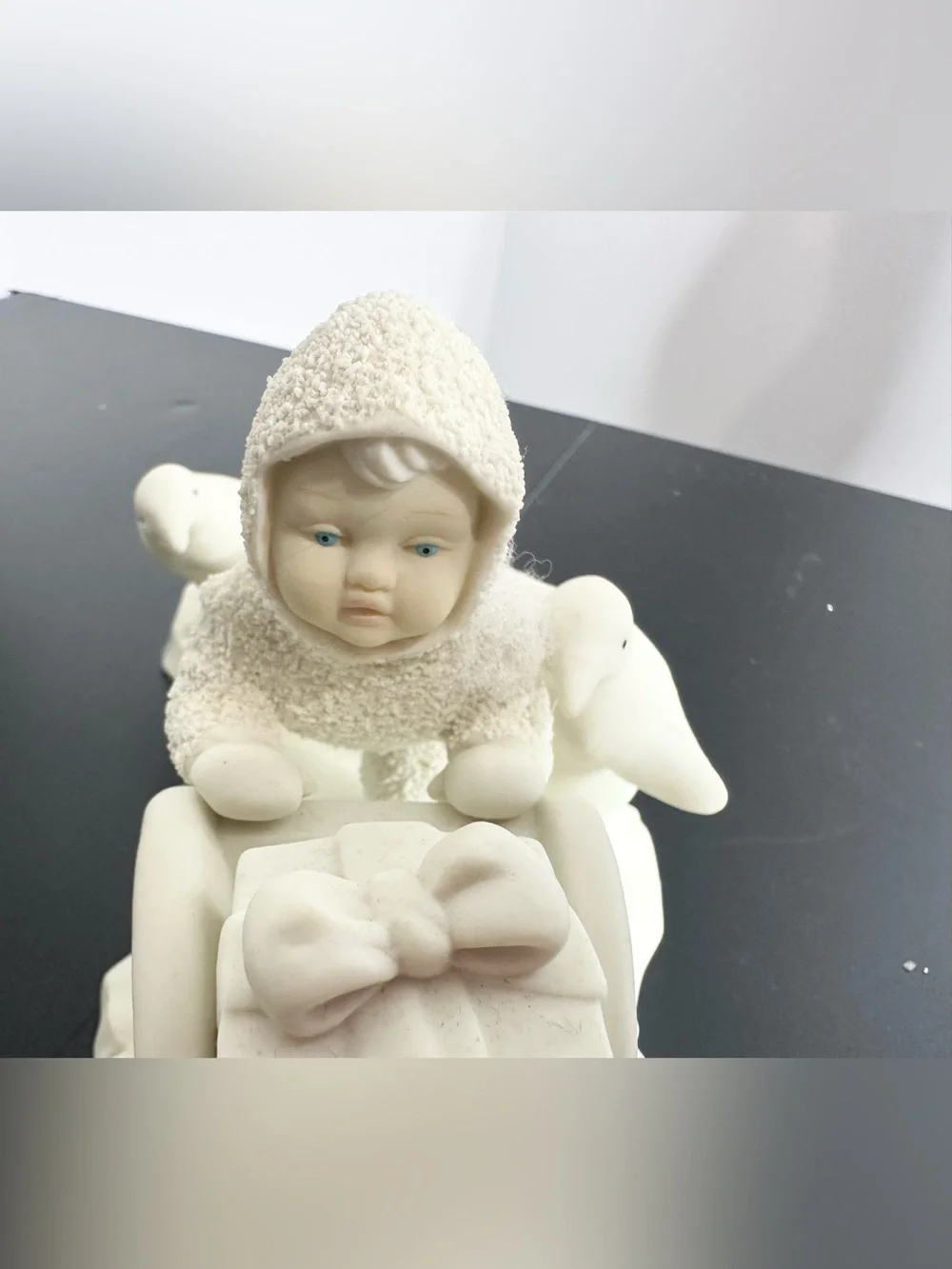 Department 56 Cream Ceramic Angel child on Sled Figurine